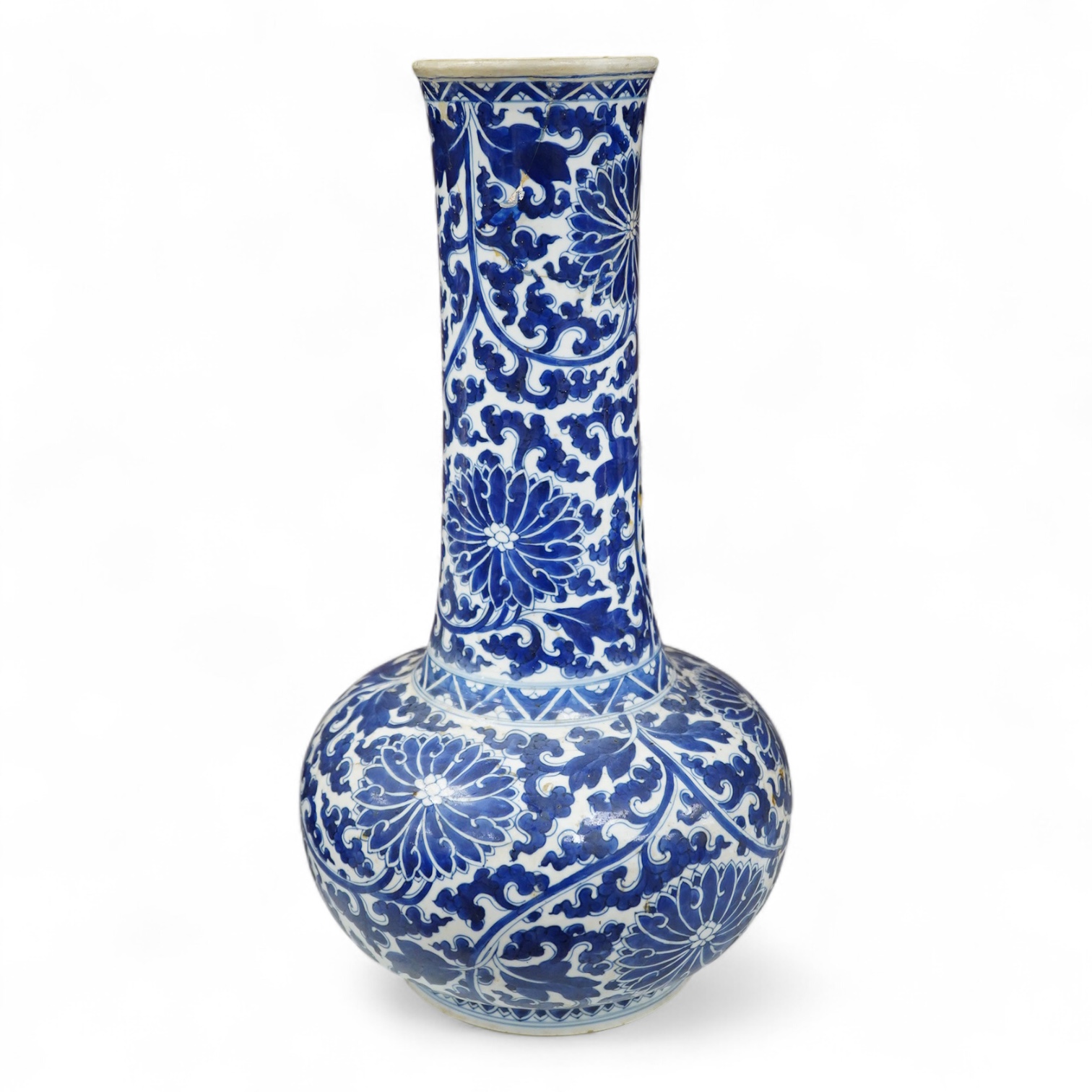 A Chinese blue and white bottle vase with lotus decoration, restored, Kangxi Period, 44cm high